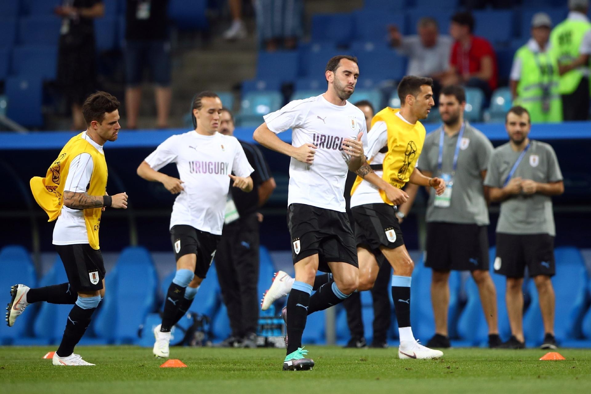 Jogadores do Uruguai durante o aquecimento para a partida - REUTERS/Hannah Mckay