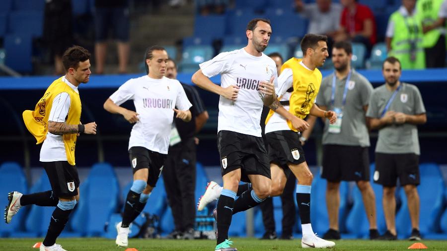Jogadores do Uruguai durante o aquecimento para a partida contra Portugal - REUTERS/Hannah Mckay