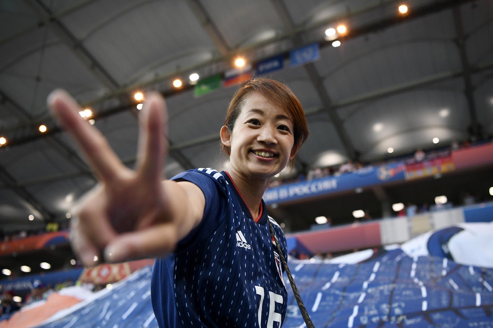 Trocedora japonesa animada com a partida entre Bélgica e Japão - Carl Court/Getty Images