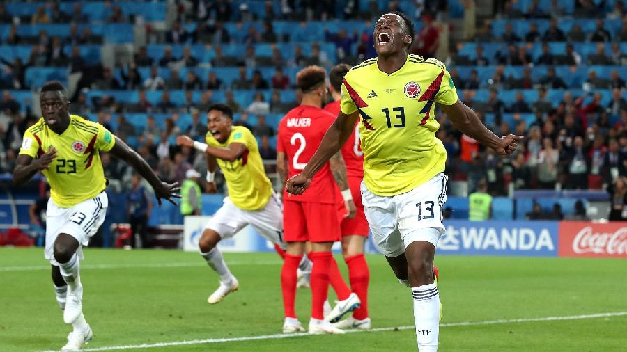 Nos acréscimos, Yerry Mina comemora depois de marcar de cabeça e empatar jogo entre Colômbia e Inglaterra - Clive Rose/Getty Images