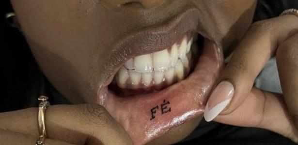 Tatuagem na boca: quais são os riscos de fazer desenho no lábio inferior,  como a cantora Iza fez?