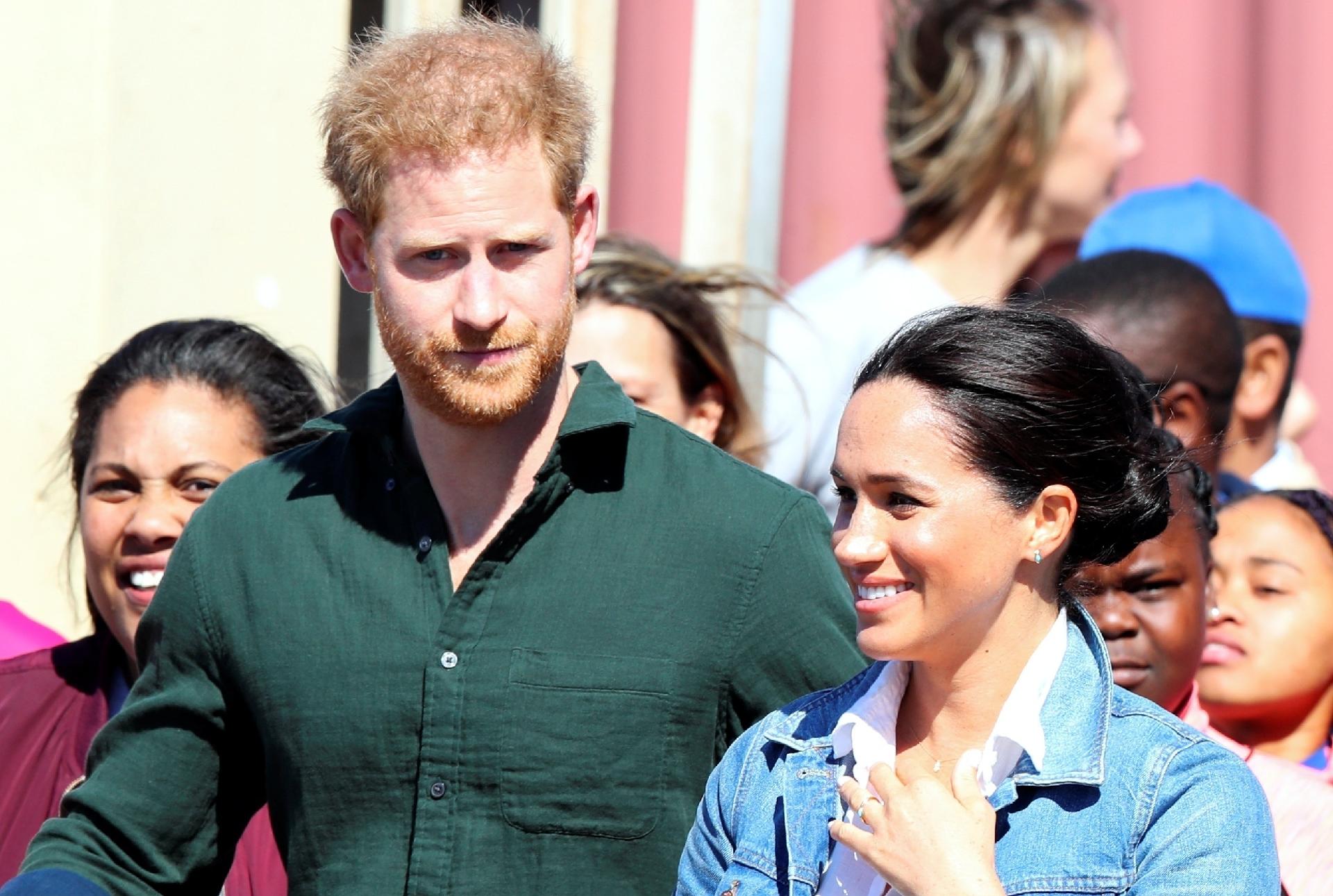 Príncipe Harry e Meghan Markle caminham pelas ruas de Cape Town, na África do Sul - Mike Hutchings/Reuters