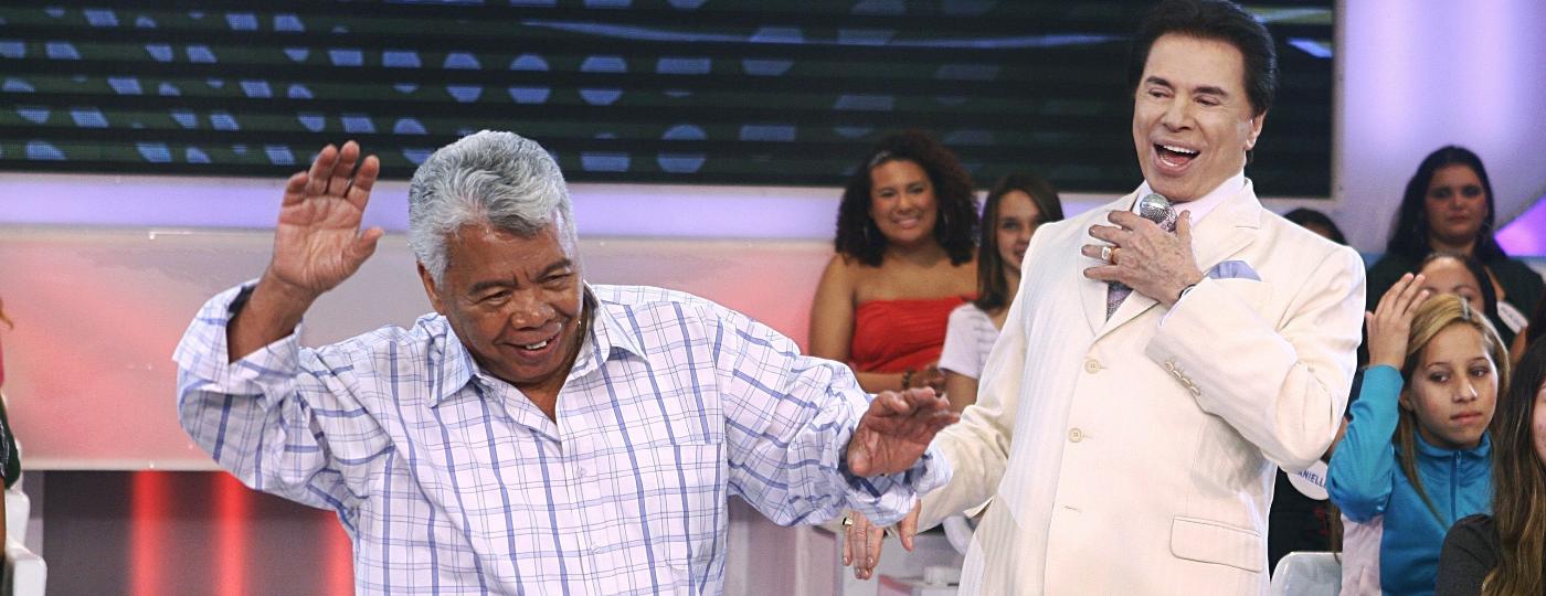 2011 - Silvio Santos e Roque no meio do auditório de seu programa no SBT - Divulgação/SBT