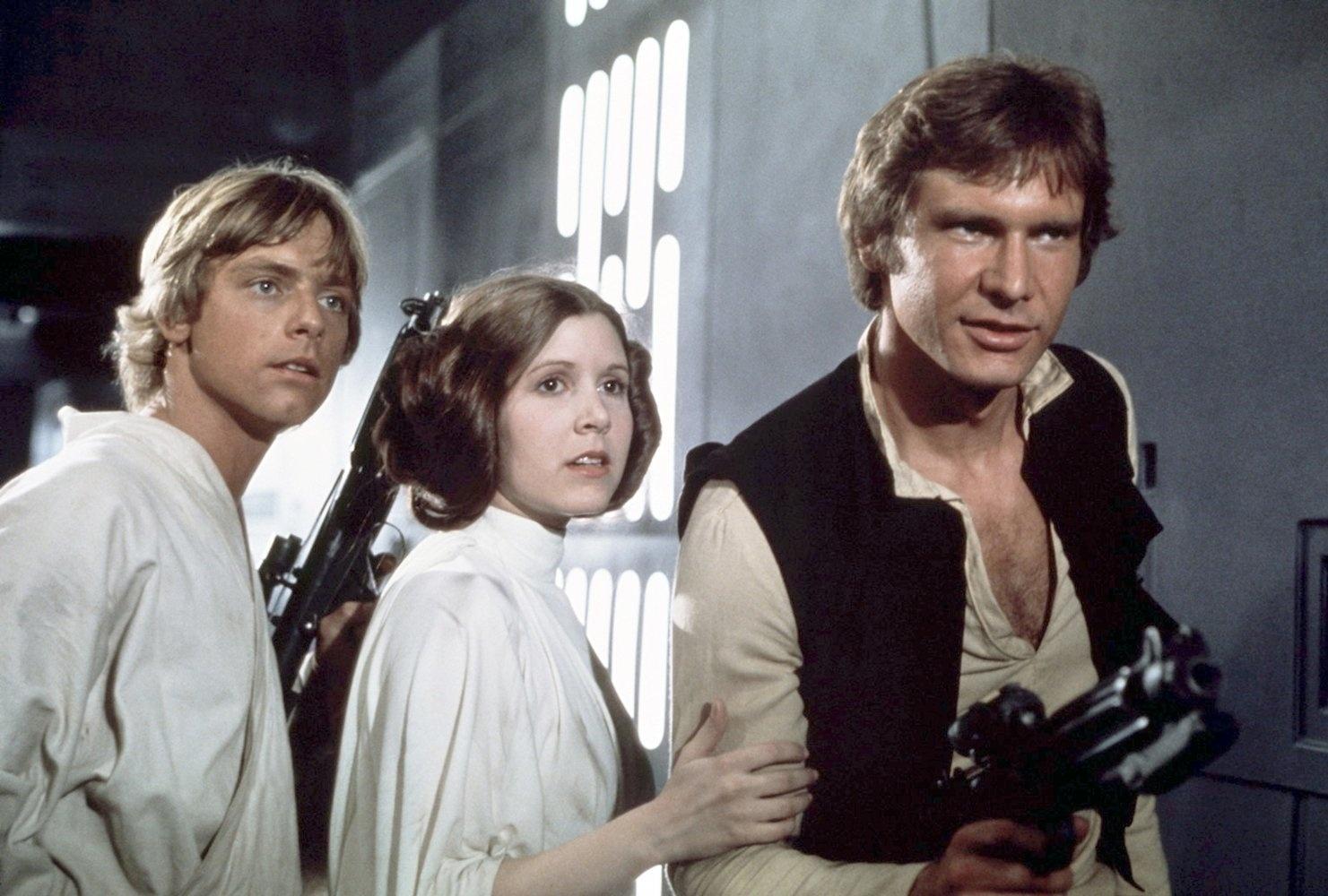 Harrison Ford, Carrie Fisher e Mark Hamill em "Star Wars: Uma Nova Esperança" (1977) - Divulgação