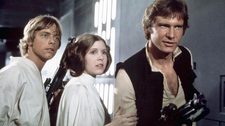 Harrison Ford, Carrie Fisher e Mark Hamill em "Star Wars: Uma Nova Esperança" (1977) - Divulgação