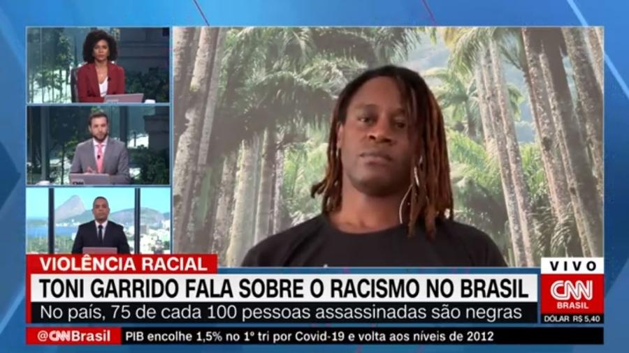 Cassius Zeilmann, da CNN Brasil, chorou após ouvir fala de Toni Garrido sobre racismo - Reprodução/CNN Brasil