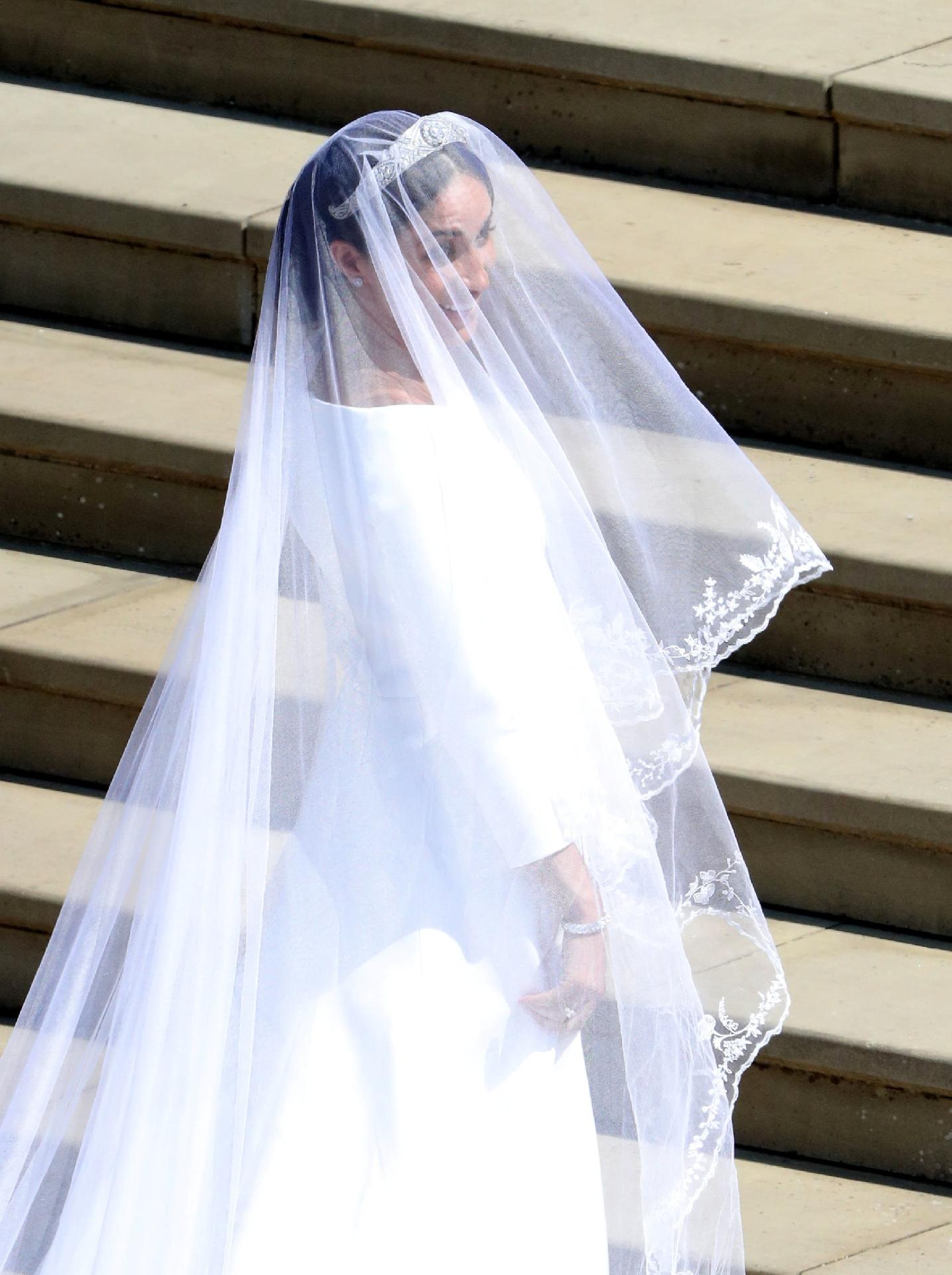 meghan markle à porta da igreja - Andrew Matthews/Reuters