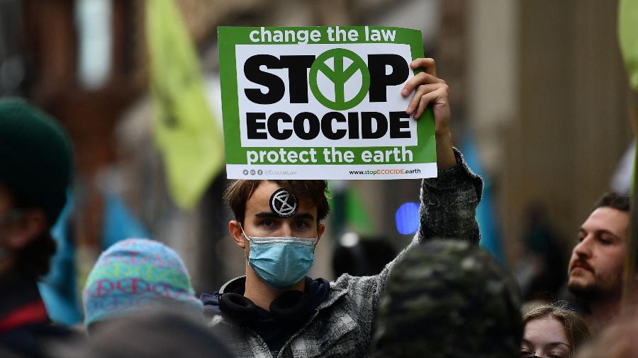 Manifestantes na COP26, em Glasgow - Ben STANSALL / AFP