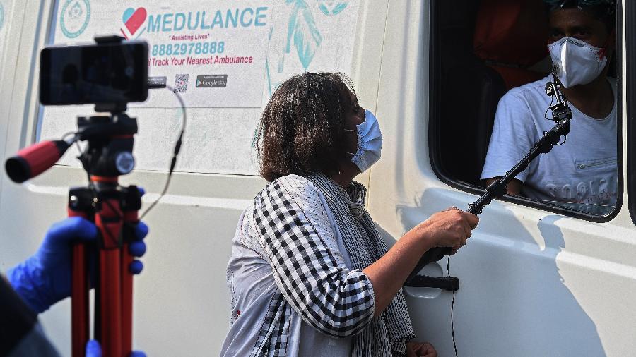 Barkha Dutt, estrela do jornalismo indiano, partiu em uma jornada para relatar a pandemia em seu país - AFP