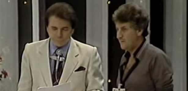 Silvio Santos conversa com o diretor Orlando Macrini, ao vivo, em seu programa que foi ao ar em 1988 - Reprodução/YouTube