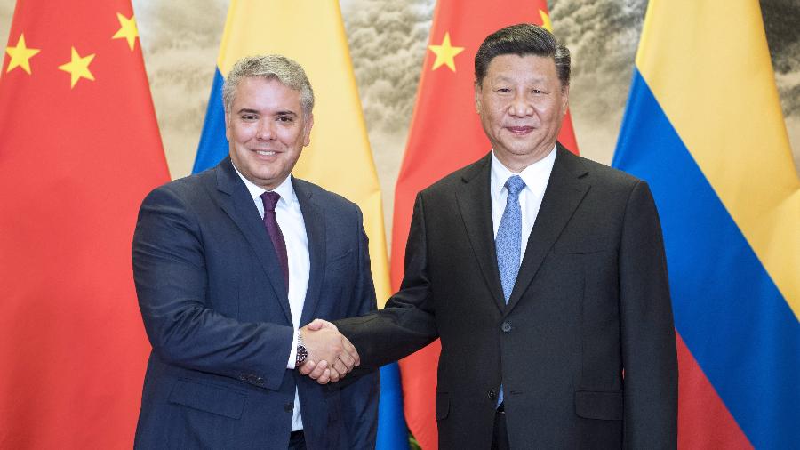 Os presidentes chinês Xi Jinping e colombiano Iván Duque durante encontro na China - Xinhua/Li Xueren