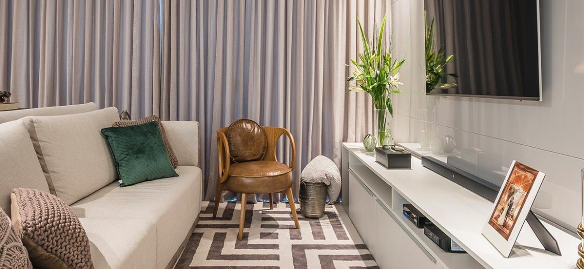 Como combinar sofá com poltrona para criar ambientes com estilo