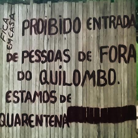 Cartaz na entrada do quilombo Pitimandeua, em Inhangapi (PA) - Malungu/Divulgação