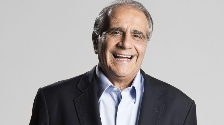 Oliveira Andrade, sorridente e bem humorado como sempre - Divulgação/Band - Divulgação/Band