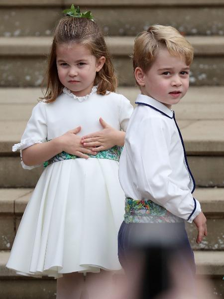 Princesa Charlotte e príncipe George durante o casamento da princesa Eugenie - AFP