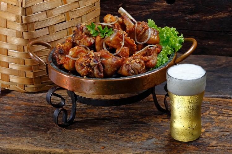 Birdie chicken with classic cold draft beer - Getty Images/iStockphoto - Getty Images/iStockphoto