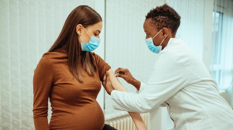 Pregnant Woman Getting Vaccinated - iStock - iStock