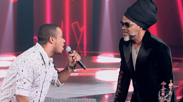 Candidato erra na expressão "Ajayô" e diverte jurados no The Voice Brasil - Reprodução - Reprodução