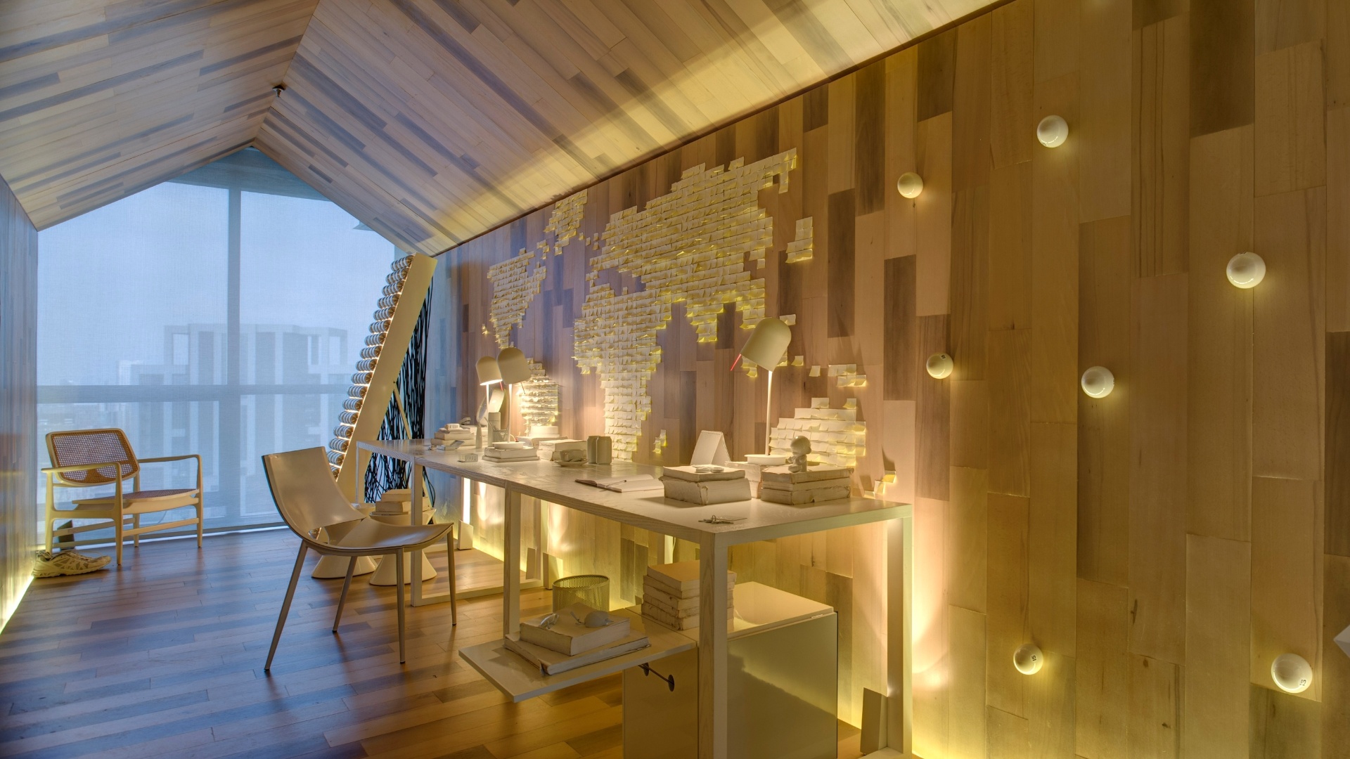 Dentro da proposta "menos é mais", a dupla estreante no evento, Fernanda Abs e Fred Benedetti, projetou um Home Office minimalista, marcado pelo monocromatismo em branco para móveis e objetos. A 3ª Mostra Black fica aberta à visitação até dia 9 de julho de 2013, nos cinco últimos andares da torre anexa ao shopping JK Iguatemi, em São Paulo - Katia Kuwabara/ UOL