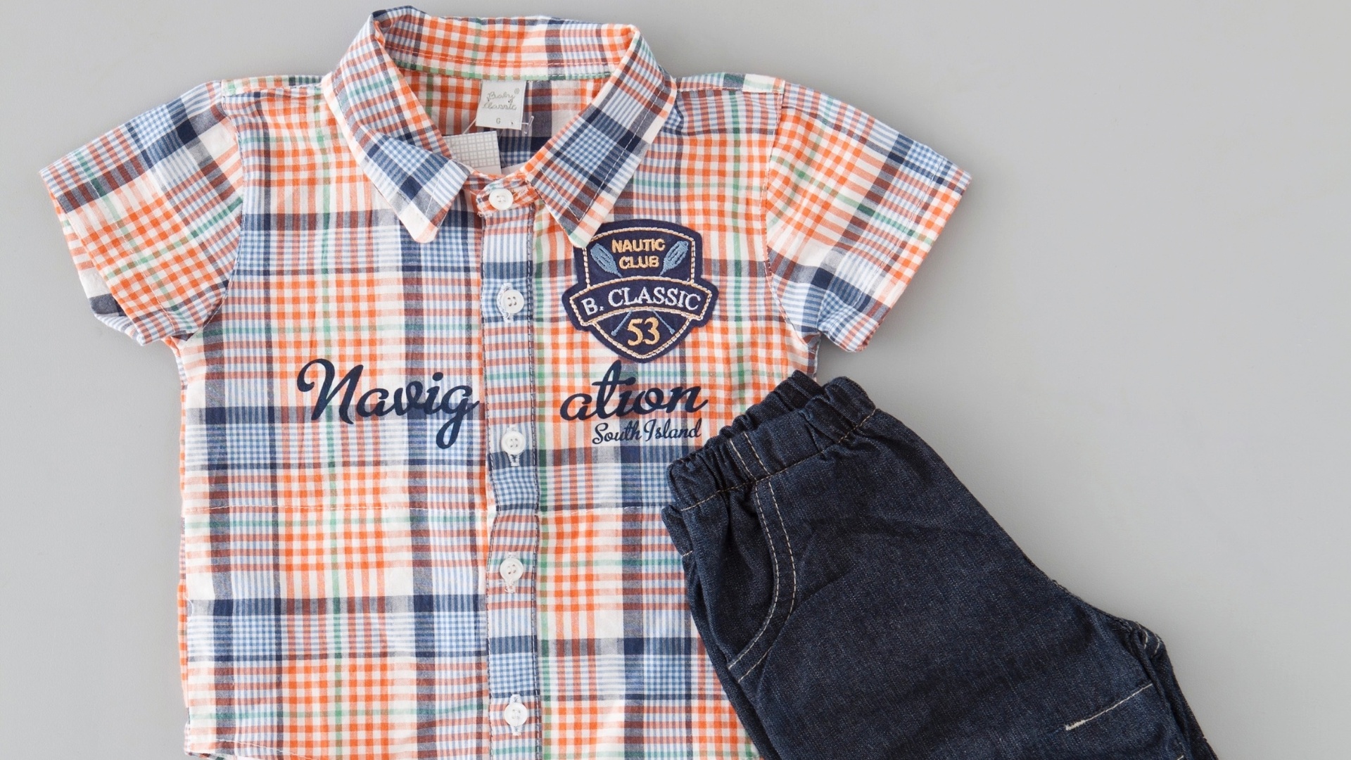 Camisa-body em xadrez com calça jeans. Tamanho: para crianças até 1 ano. Da Alô Bebê. SAC (11) 3648-3000. R$ 99,90. Preço consultado em maio de 2013. Sujeito a alterações - Divulgação