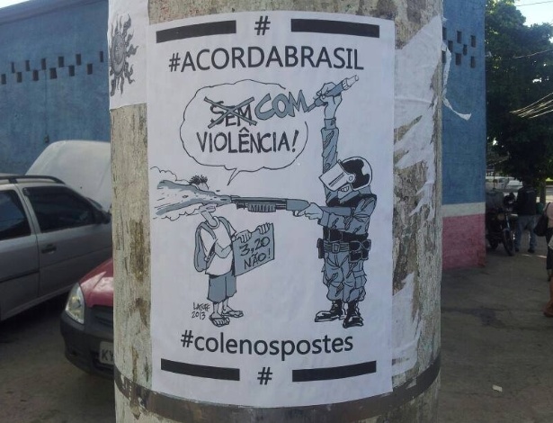 Manifestantes colam charge de Latuff em poste da capital paulista - Carlos Latuff/Divulgação