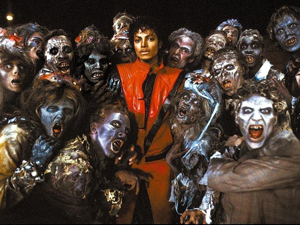 Michael Jackson em meio aos "zumbis" do clipe da música "Thriller" - Divulgação / Digicol