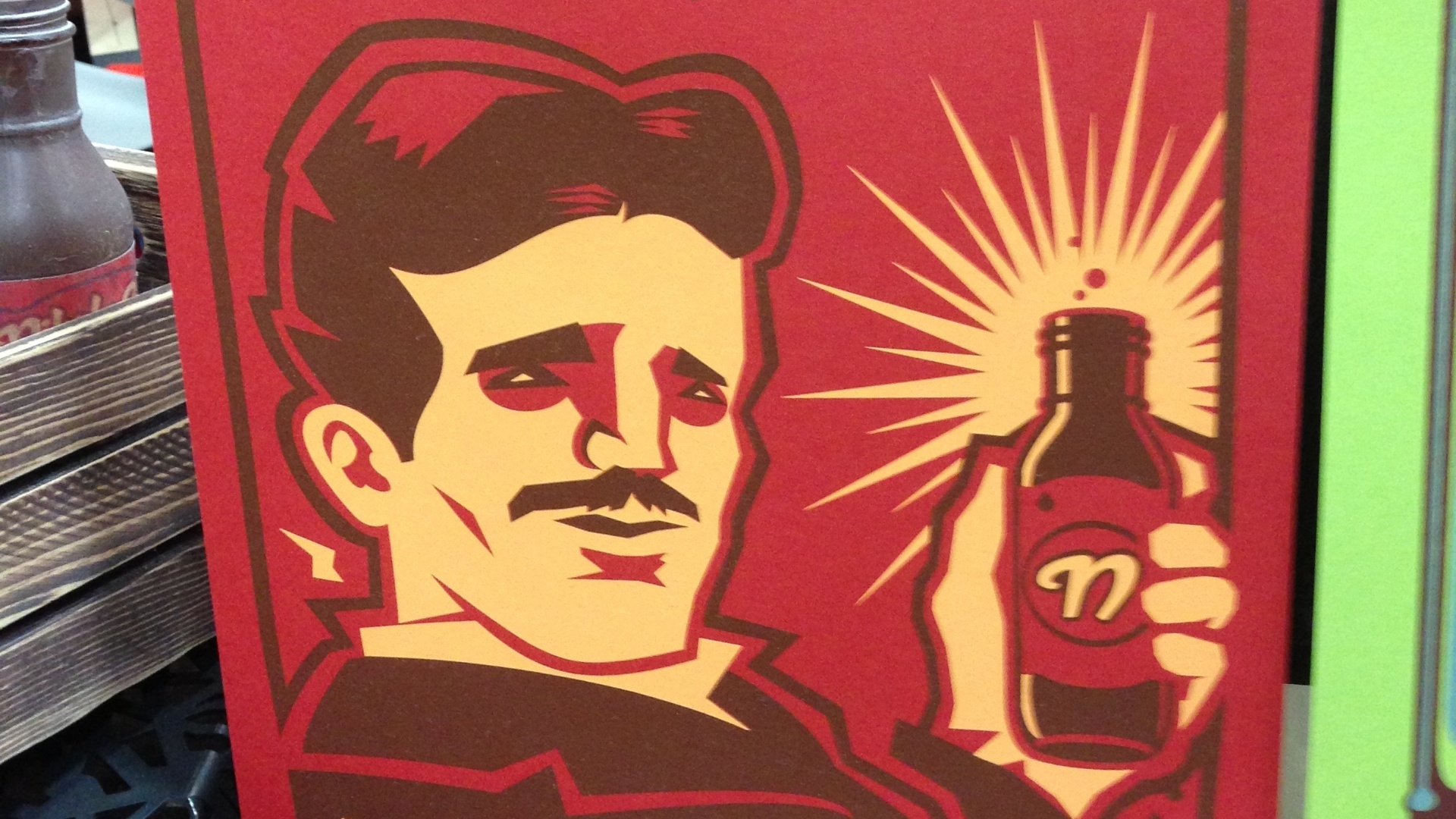 17.jul.2013 - Personagens da história e da literatura viram pôsteres de propagandas fictícias. O inventor Nikola Tesla e o energético Nikola Cola no pôster do artista Daniel Davis - Natalia Engler/UOL