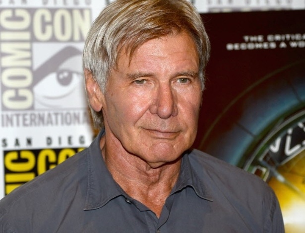 18.jul.2013 - O ator Harrison Ford posa para fotos em evento de "Divergent" e "Jogo do Exterminador" durante a Comic-Con - Ethan Miller/AFP
