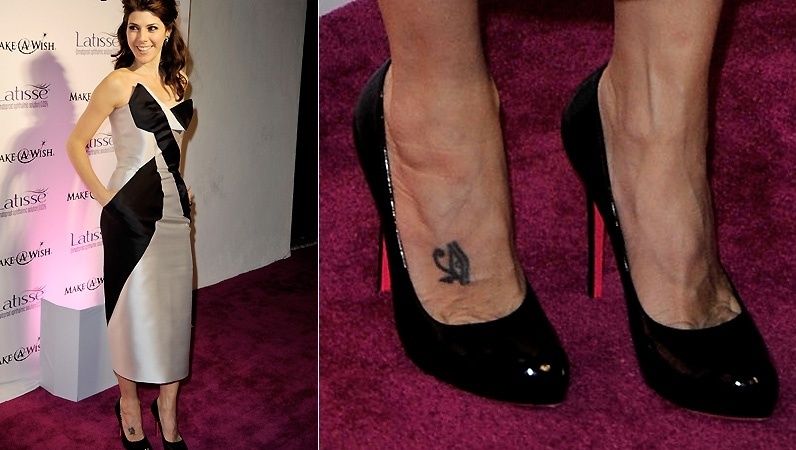 A atriz Marisa Tomei tem o olho de Hórus tatuado no pé direito