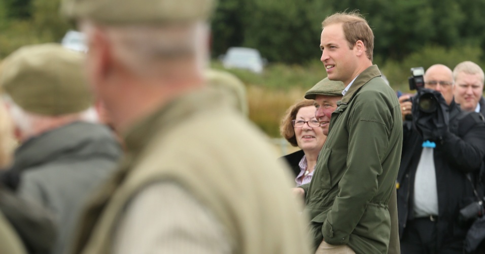 14.ago.2013 - Príncipe William participa de seu primeiro evento oficial após o nascimento do filho, em Bangor, Wales