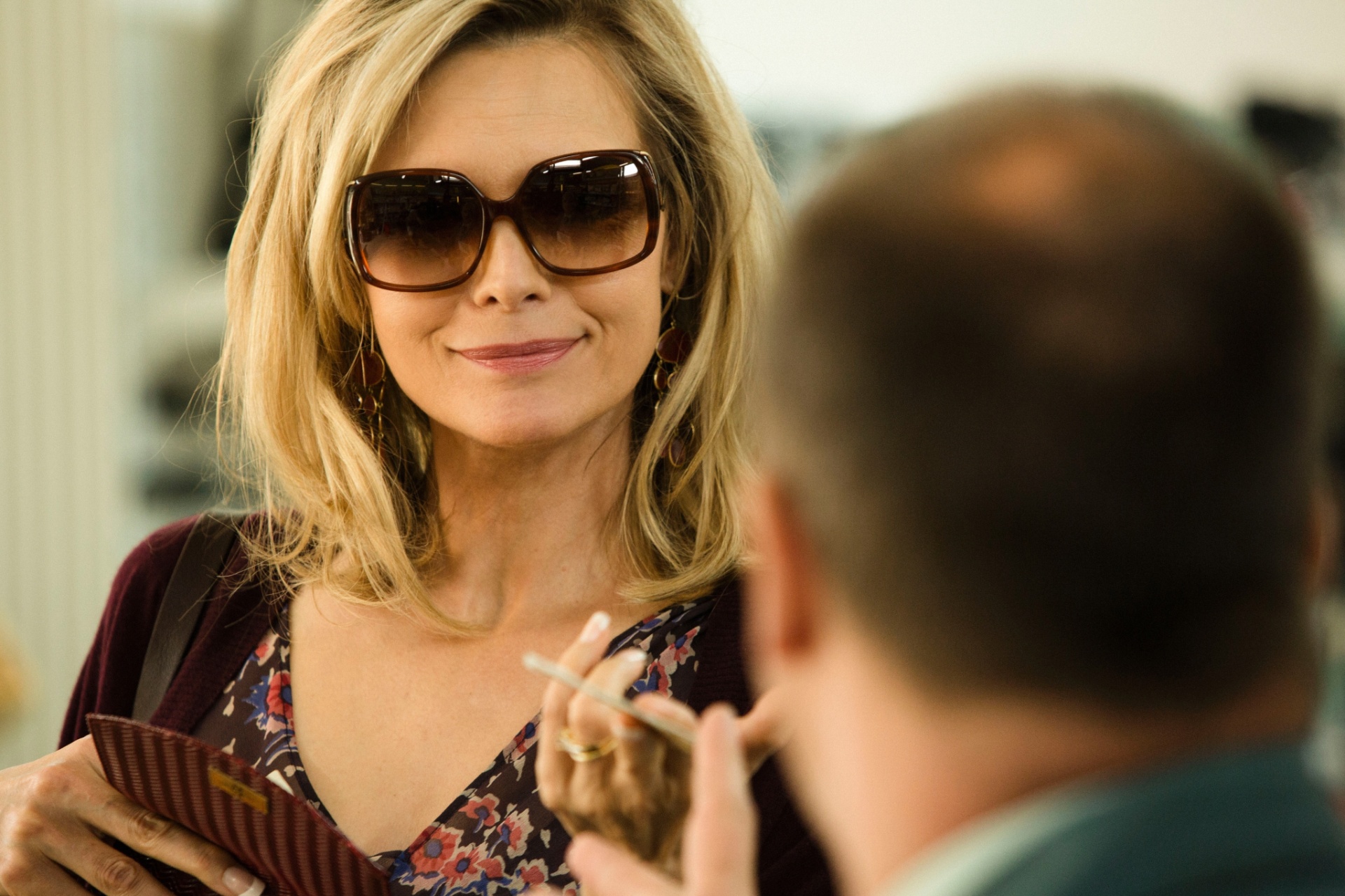 Michelle Pfeiffer em cena de "A Família", de Luc Besson - Divulgação