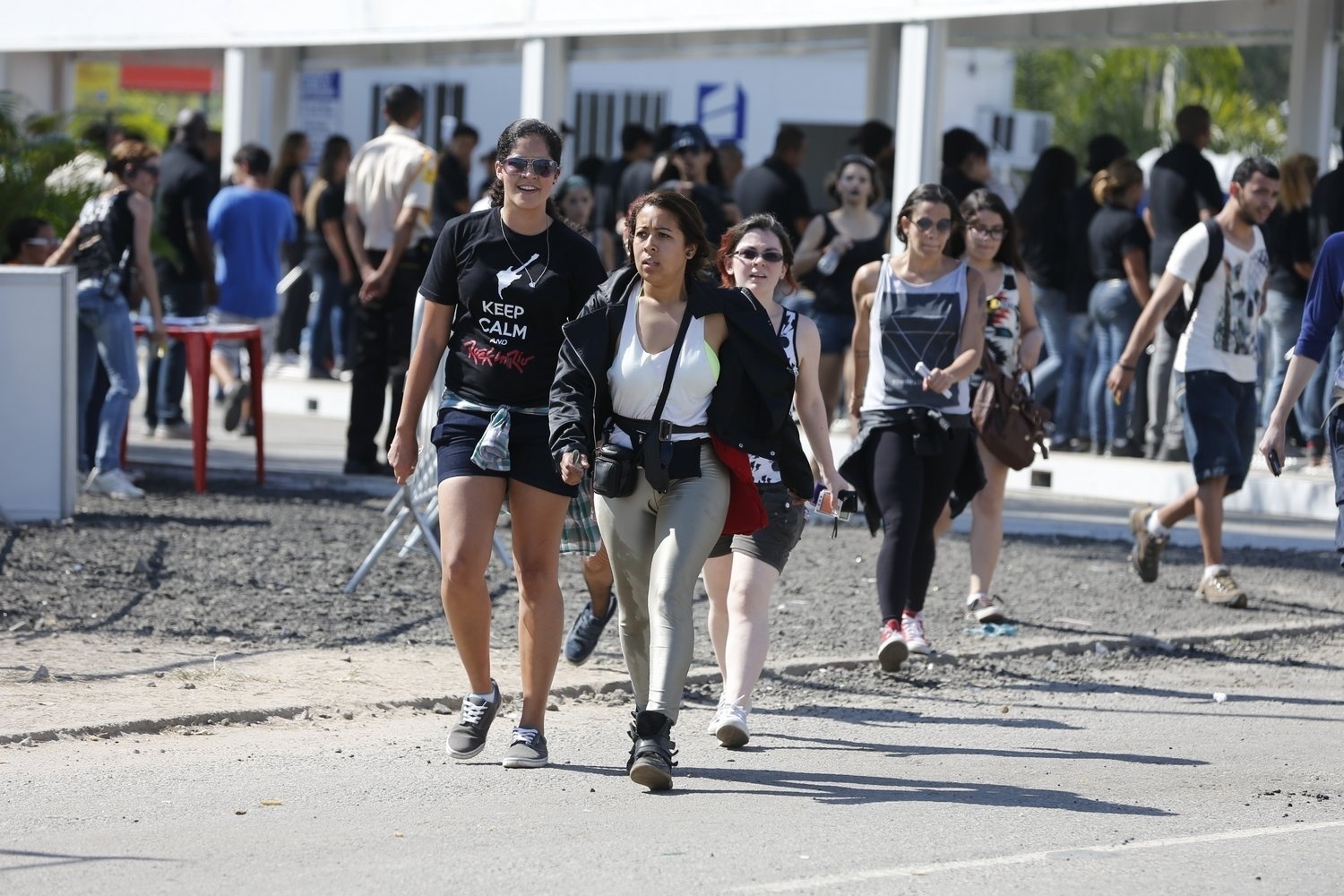 14.set.2013- Público corre após abertura dos portões da Cidade do Rock - Felipe Panfili/AgNews