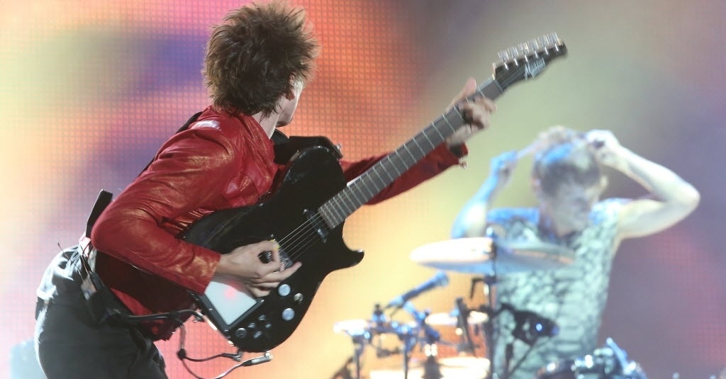 14.set.2013 - A banda Muse se apresenta no último show do palco Mundo no segundo dia do Rock in Rio 2013 - Marco Antônio Teixeira/UOL