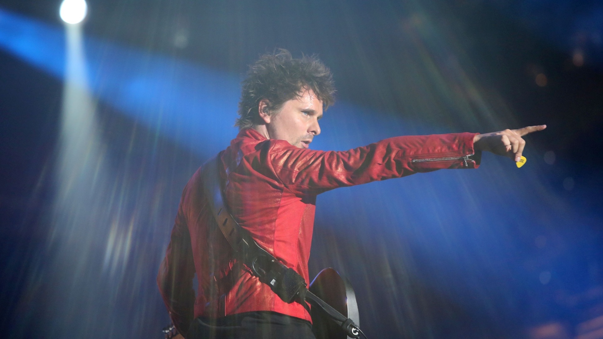 14.set.2013 - A banda Muse se apresenta no último show do palco Mundo no segundo dia do Rock in Rio 2013 - Marco Antônio Teixeira/UOL