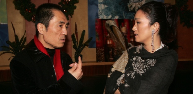 O diretor Zhang Yimou e a atriz Gong Li no after party do filme "A Maldição da Flor Dourada", em Nova York - Peter Kramer/Getty Images