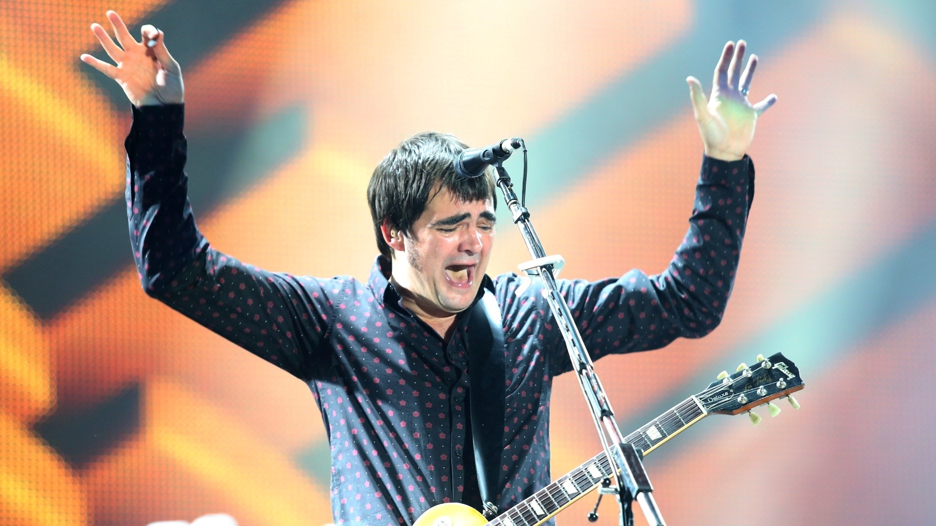 21.set.2013 - Samuel Rosa, do Skank, durante apresentação no Rock in Rio - Marco Antônio Teixeira/UOL