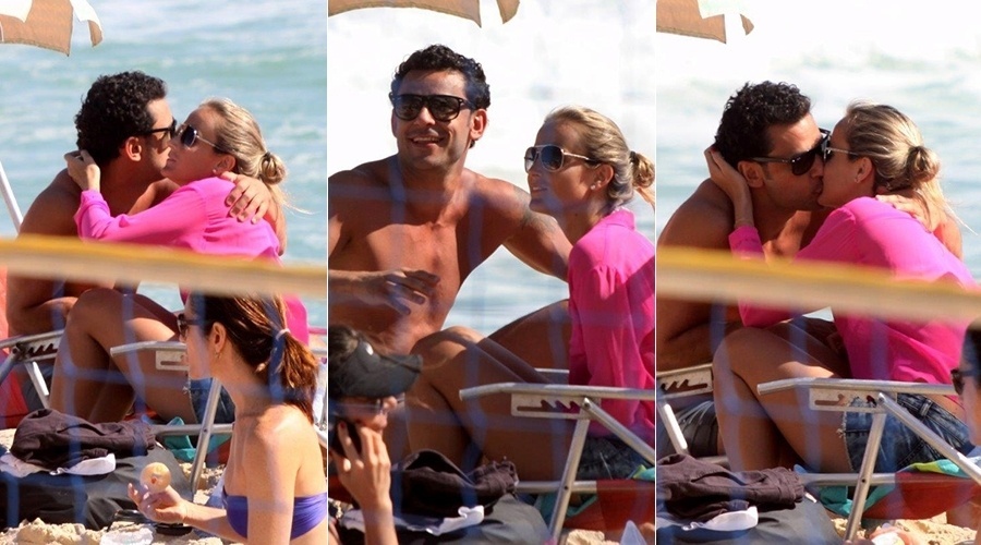 28.set.2013 - Fred troca beijos com loira em praia do Rio