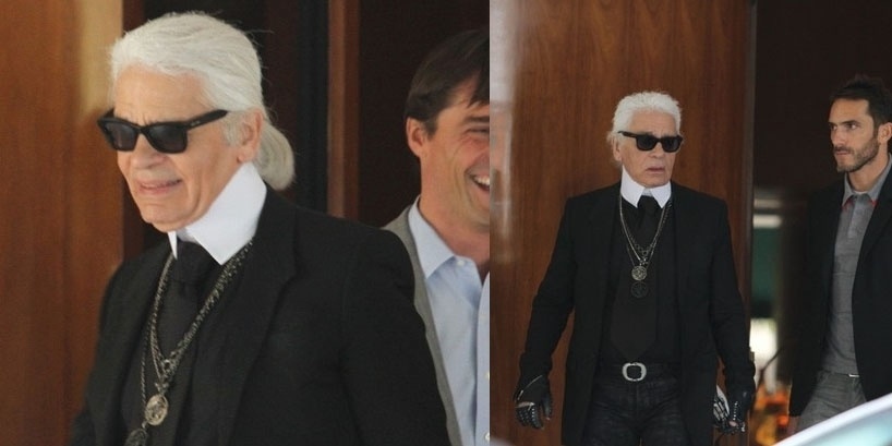Karl Lagerfeld, o estilista da Chanel, é flagrado saindo do hotel em que está hospedado, em São Paulo. Ele está no país para prestigiar a abertura da exposição "The Little Black Jacket", no Parque do Ibirapuera