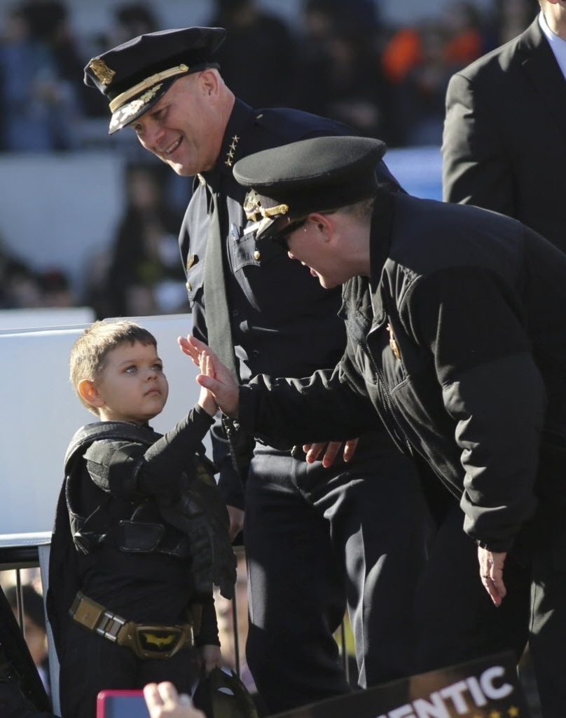 15.nov.2013 - Garoto vive Batman por um dia em San Francisco - Robert Galbraith/Reuters