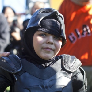 15.nov.2013 - Garoto vive Batman por um dia em San Francisco - Ramin Talaie/Getty Images/AFP