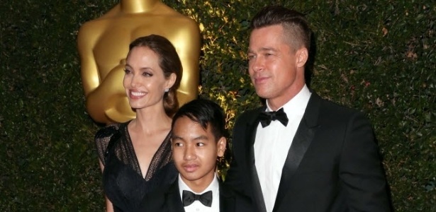 Angelina Jolie, Brad Pitt e Maddox, filho mais velho do casal - AFP