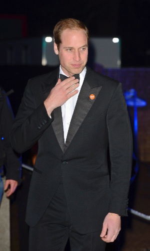 26.nov.2013 - Príncipe William promove evento de caridade no Palácio de Kensignton, residência oficial da realeza em Londres, Inglaterra. Durante o jantar, ele cantou "Living on a Prayer" com Bon Jovi e Taylor Swift