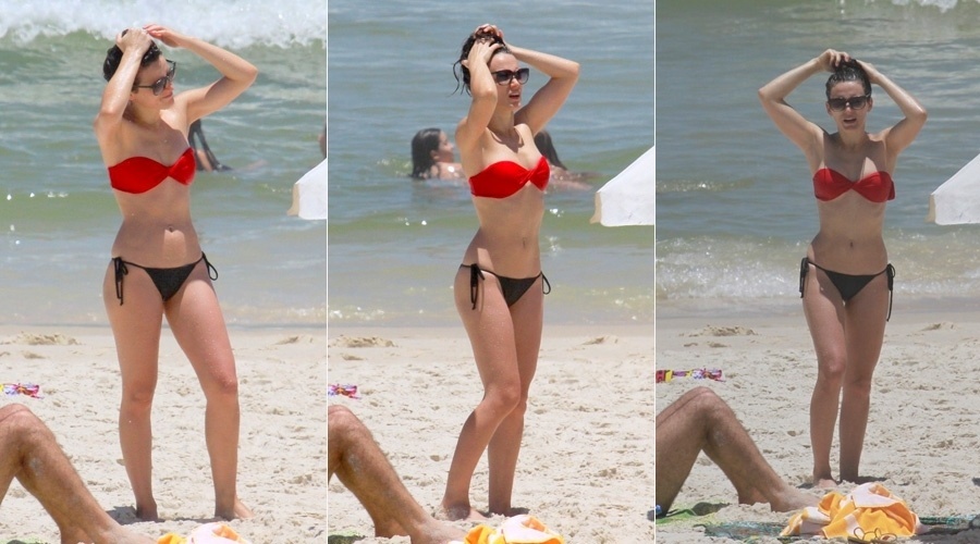 3.dez.2013 - Bianca Bin curtiu praia na Barra da Tijuca, zona oeste do Rio. A atriz estava acompanhada do marido, Pedro Brandão