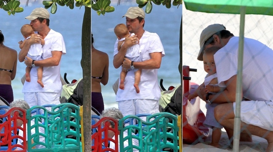 3.dez.2013 - Marcelo Serrado brincou com o filho em um parquinho na praia de Ipanema, zona sul do Rio