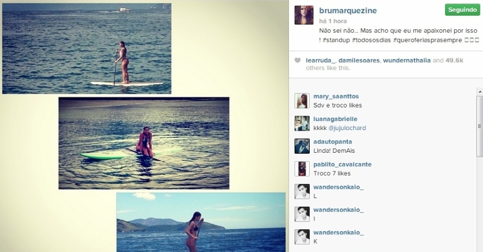 31.dez.2013 - De férias, atriz Bruna Marquezine pratica stand up paddle e se diverte sob o sol