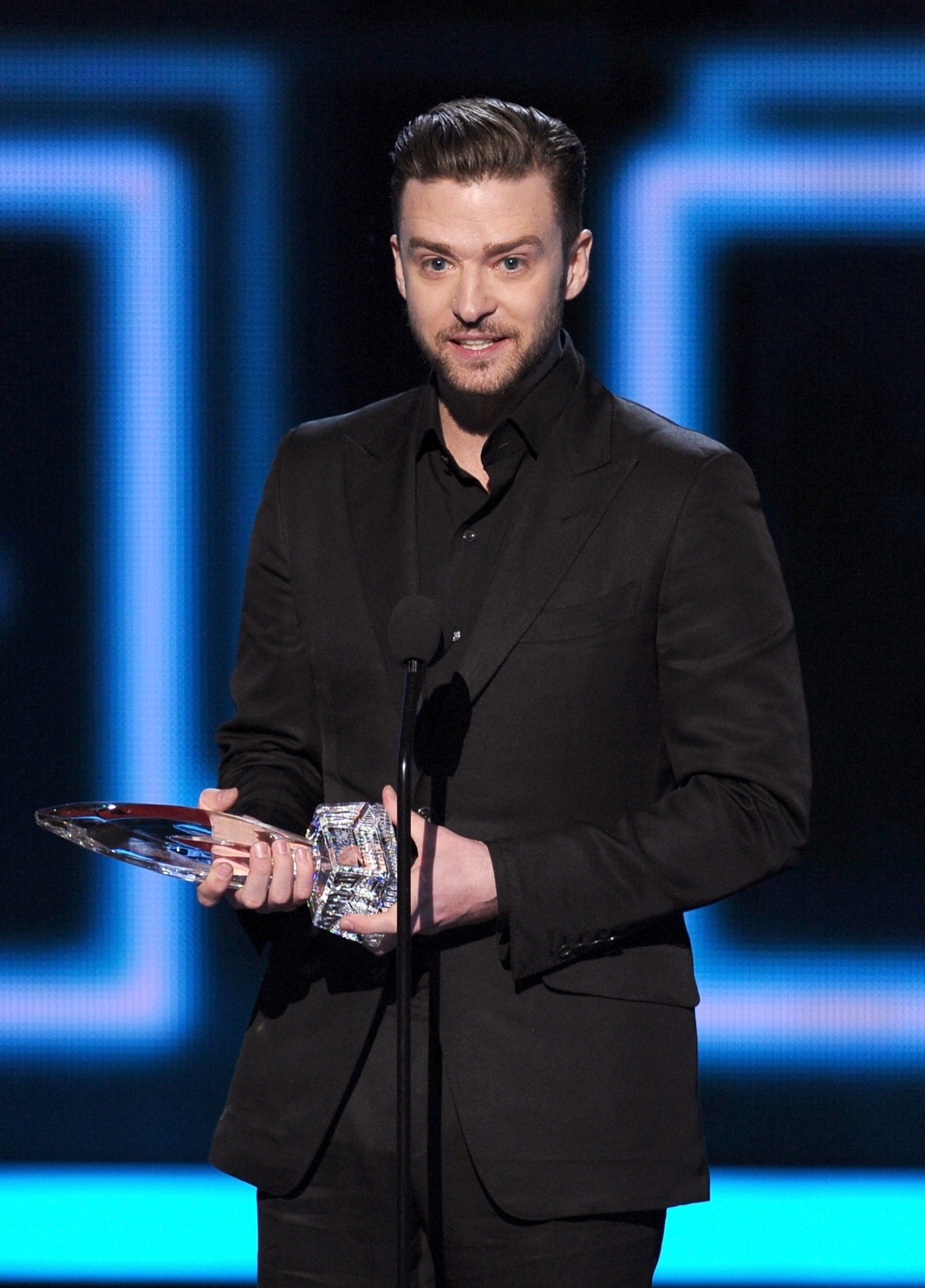 8.jan.2014 - Justin Timberlake fatura o prêmio de Álbum Favorito por 20/20 The Experience, lançado em 2013 - Reuters