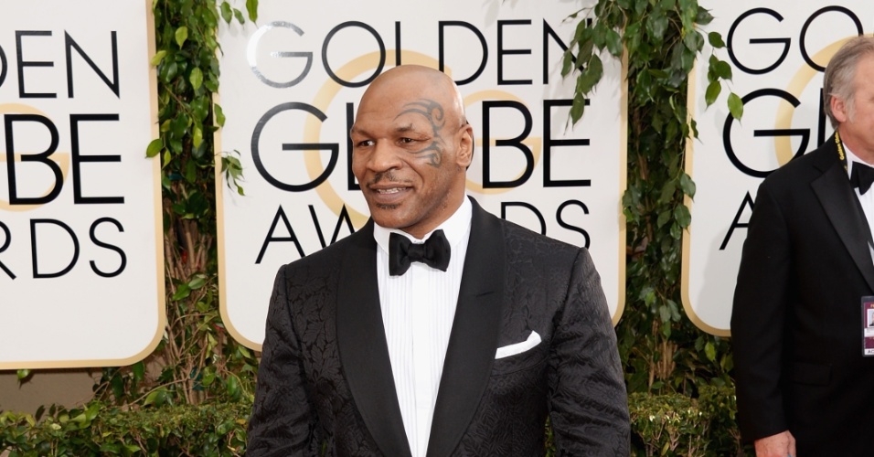 12.jan.2014 - O lutador Mike Tyson chega para a edição 2014 do Globo de Ouro, em Beverly Hills