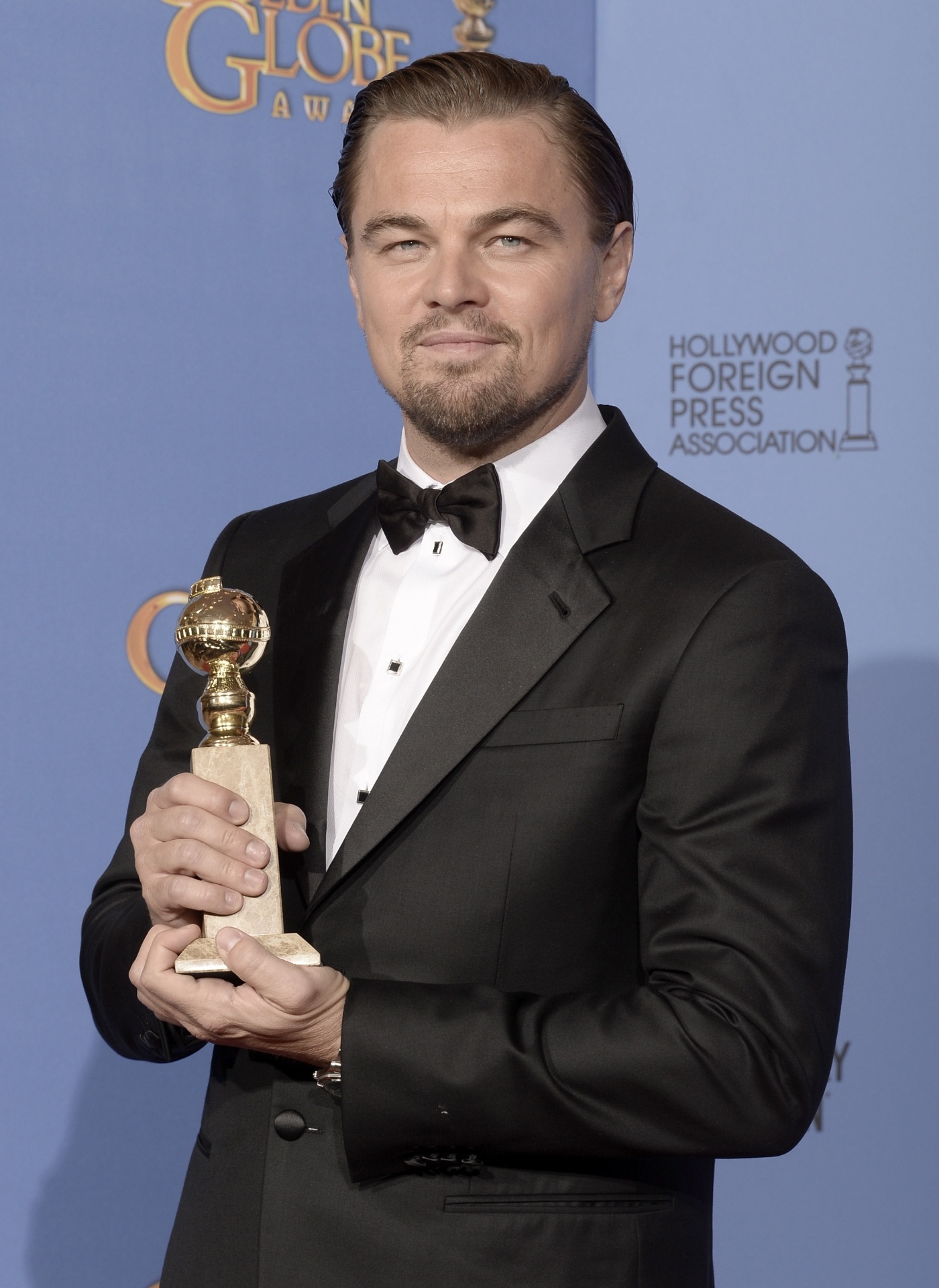 12.jan.2014 - Leonardo DiCaprio posa com prêmio de melhor ator de comédia/musical "O Lobo de Wall Street" - Kevin Winter/Getty Images