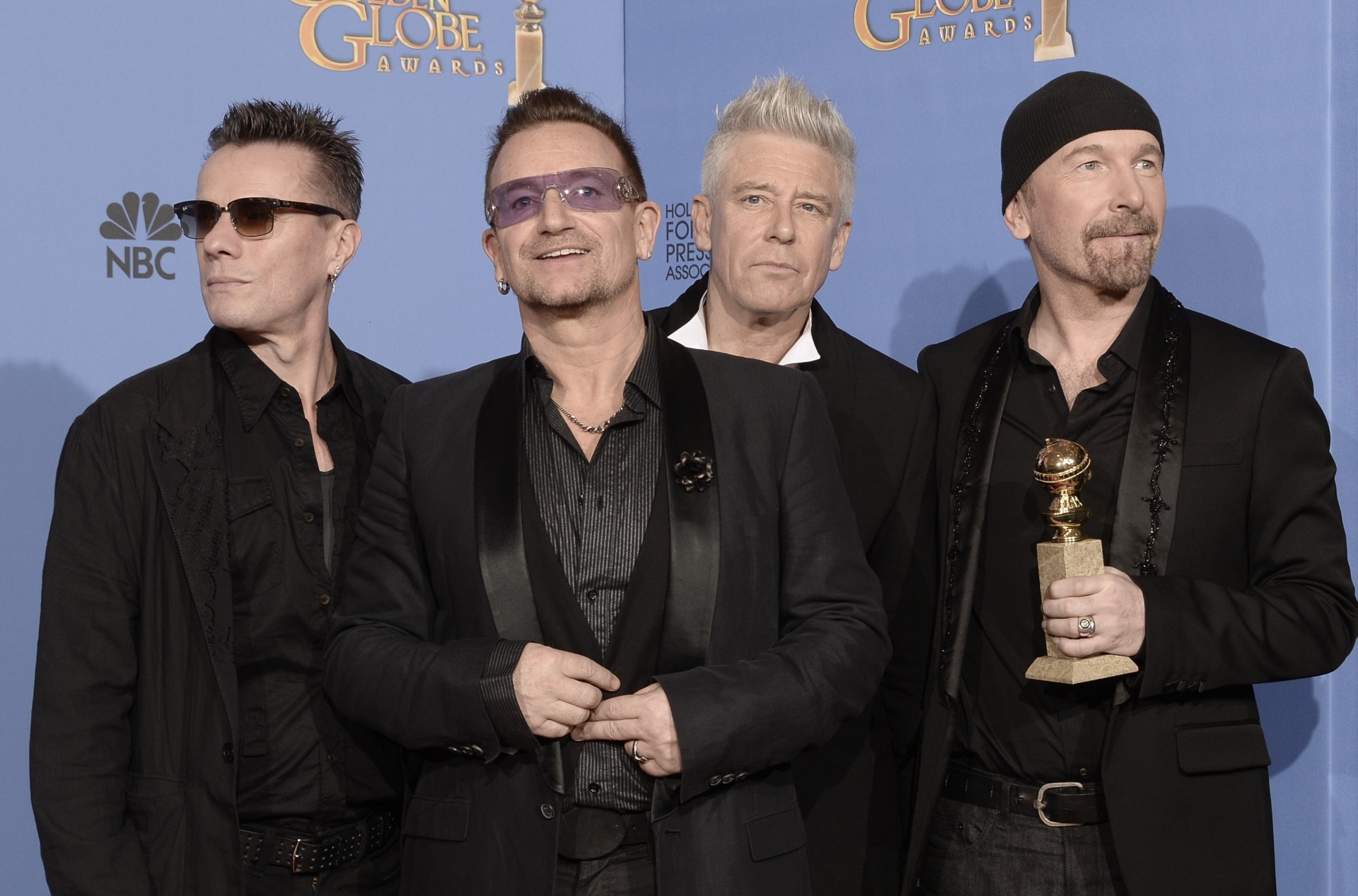 12.jan.2014 - U2 leva o prêmio de melhor canção no Globo de Ouro 2014 por "Ordinary Love", do filme "Mandela" - Getty Images