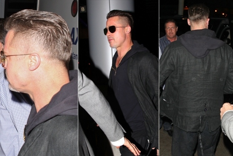 17.jan.2014 - Brad Pitt aparece com o cabelo mais curto e raspado dos lados no aeroporto de Los Angeles, nos Estados Unidos